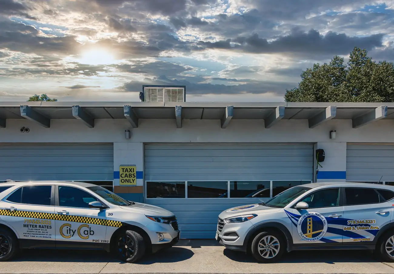 Pueblo City Cab and Golden Gate Manor Transportation vehicles in front of dispatch office. Pueblo City Cab and Golden Gate Manor Transportation vehicles in front of dispatch office.